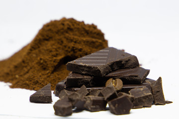 dark dark chocolate and coffee on a white background
