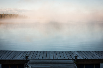 Fog on the lake at sunrise