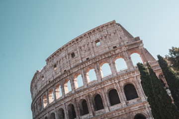 Fototapeta premium view of Rome Colosseum in Rome , Italy . The Colosseum was built in the time of Ancient Rome in the city center