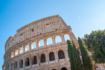 Fototapeta premium view of Rome Colosseum in Rome , Italy . The Colosseum was built in the time of Ancient Rome in the city center