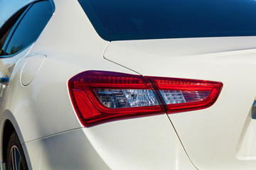 Headlight of a white car