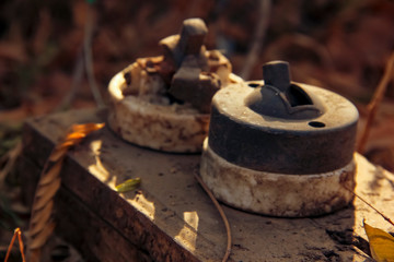old electric switch on wooden board