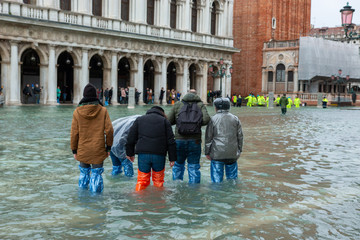 high water in Venice high tide buildings and flooded streets