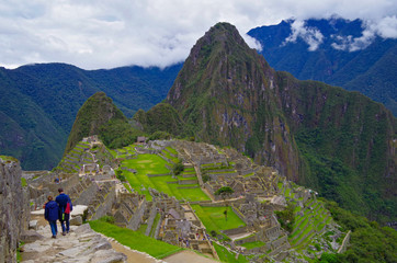 Machu Picchu, legendary Inka capital Peruvian Andes. Historic and ancient ruins and stonewalls high in the mountains. UNESCO world cultural heritage, new wonder of the world and tourist destination