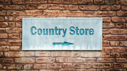 Fototapeta na wymiar Street Sign to Country Store