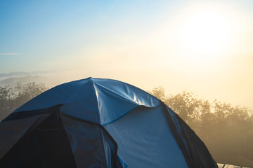 landscape, tourist tent in forest camp ,fog and cloud mountain valley , Morning fog .