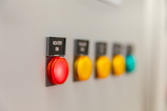 Power distributing cabinet,Electrical selector switch,button switch,Electrical switch gear at Low Voltage motor control center cabinet in power plant. blurred for background.