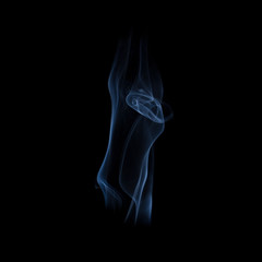 Obraz premium Beautiful swirls of blue smoke on a black background