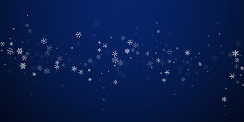 Sparse snowfall Christmas background. Subtle flyin