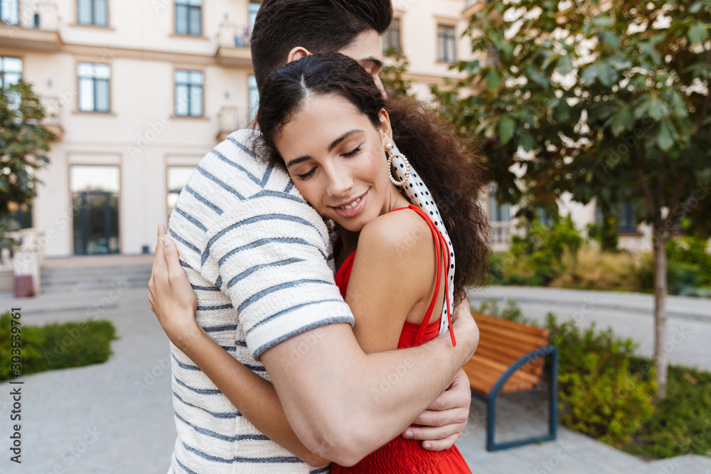 Sticker Image of happy romantic couple smiling and hugging