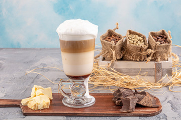 Coffee latte in glass with chocolate. Cup of Coffee Latte