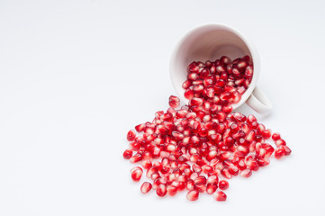 Fresh pomegranate isolated on white background