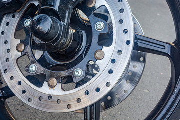 front wheel disc brakes motorcycle, brake disc close-up