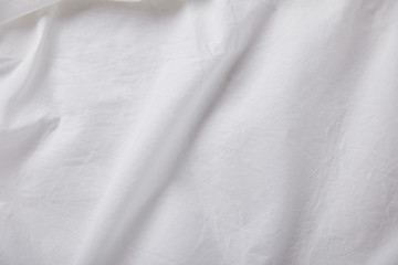 top view of crumpled white cloth with copy space