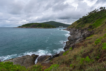 Fototapeta na wymiar Rocky coast of the cape in the Andaman Sea, landscape in cloudy weather