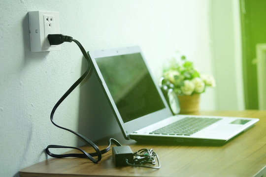 Laptop Charger Images – Browse 8,421 Stock Photos, Vectors, and Video |  Adobe Stock