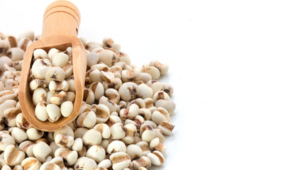 Flat lay composition of organic whole grains seeds or natural cereal in wooden scoop isolated on white background