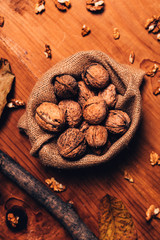 Walnut heap in burlap sack, top view