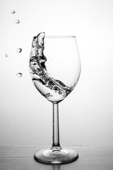 Glass with water up and splash