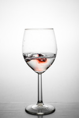 Paint swirling in water.