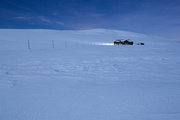 Winter landscape of the Krkonose during a fullmoon night in winter