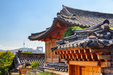 Fototapeta na wymiar Scenic black tile roofs of traditional Korean houses in Seoul