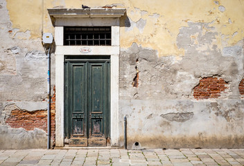 Old wooden door in Venice Italy