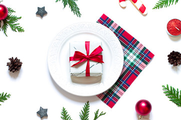 Christmas table settings with festive decoration on the white background flat lay. Top view