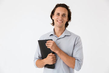 Image of happy businessman in office shirt holding documents folder