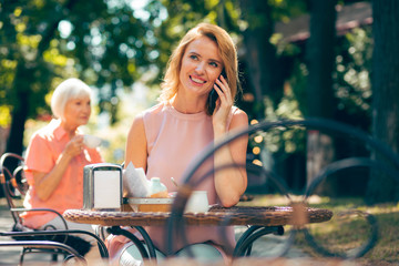 Pleasant phone talk with best friend stock photo
