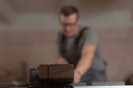 Working with a circular saw in a carpentry workshop.