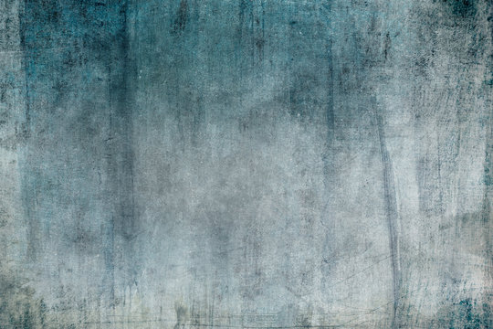 Old blue grungy wall background or texture