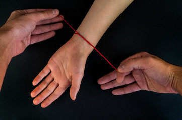 Wonderful red thread on a black background in the cart