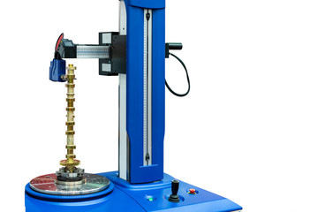 automobile part during setup on rotate chuck of high technology & precision measuring machine for multi inspection surface roundness dimension shape bending appearance  isolated with clipping path