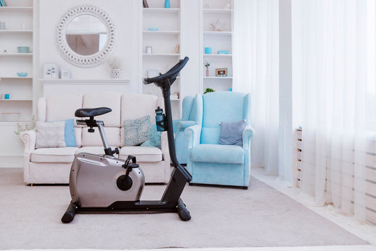 Sports equipment - exercise bike, standing in the living room
