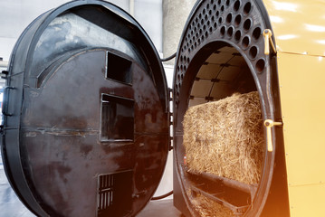 Industrial straw-burning boiler for heating large rooms
