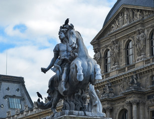 Fototapeta na wymiar View of Louvre Museum in Paris, France