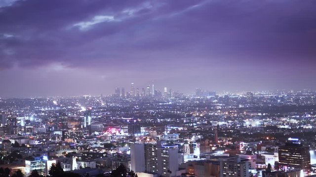 Dramatic Time Lapse Of Los Angeles At Night. 4k Rise. Beautiful Sky With Clouds. Location: Los Angeles, California. 