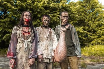 Obraz premium Zombies go for meat on a stick, zombies in harness and skateboarder