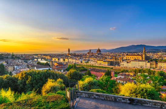 Sunset view of Florence, Ponte Vecchio, Palazzo Vecchio and Florence Duomo, Italy. Architecture and landmark of Florence. Cityscape of Florence