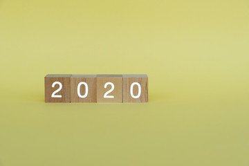 Number 2020 on wooden blocks, new year concept