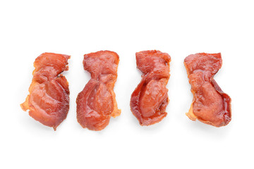 Tasty fried bacon on white background