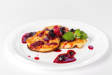 pancakes with jam on a white background
