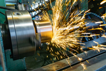 Internal processing of a polished surface with sparks in the workplace.
