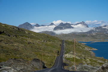 Road into snow glacier covered mountain