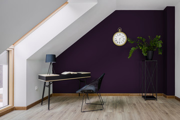 Home office with violet wall
