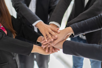 group business people hands were collaboration to trust in business success concept of teamwork partnership in company