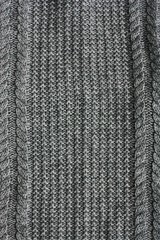 Beautiful knitted grey sweater close up view