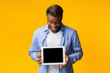 Man Holding Digital Tablet With Blank Screen Standing, Studio, Mockup