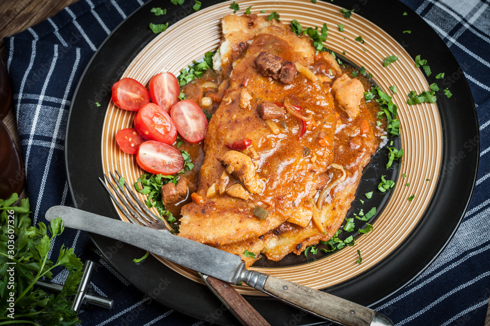 Wall mural potato pancakes with meat, vegetable, tomato and parsley.